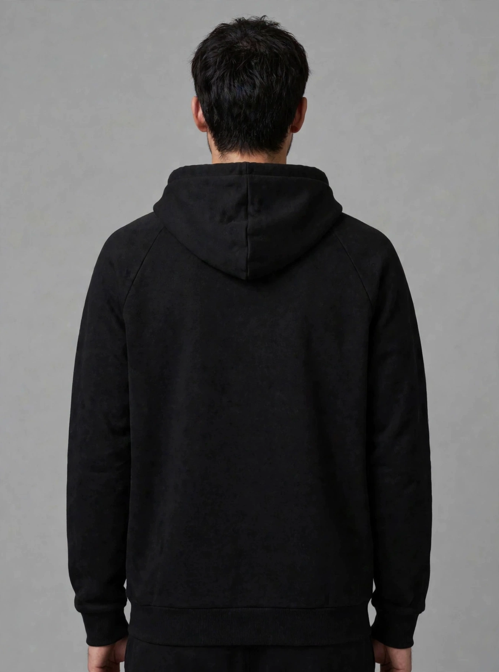 The Collective Black Hoodie — black on model, back view | 707 Official zip hoodie