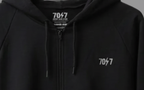 The Collective Black Hoodie — black collar and 70ϟ7 chest logo close-up | 707 Official zip hoodie