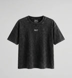 Black t-shirt with a logo on a gray background